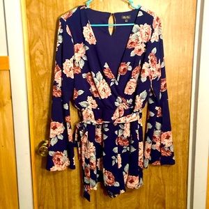 Only worn once, new blue and floral romper